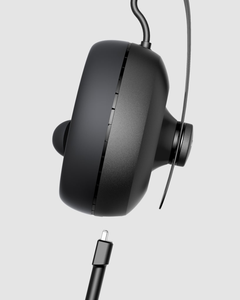 Photo of the Nuraphone with a cable almost inserted